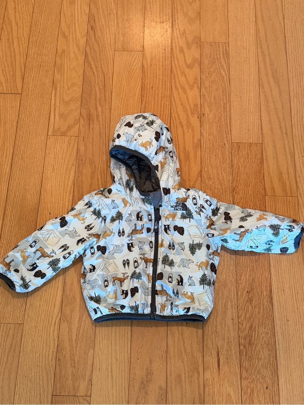 North Face reversible Kids Hooded Outdoor Jacket - Light Blue Animal Print